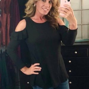 Cold shoulder top with ruffle details